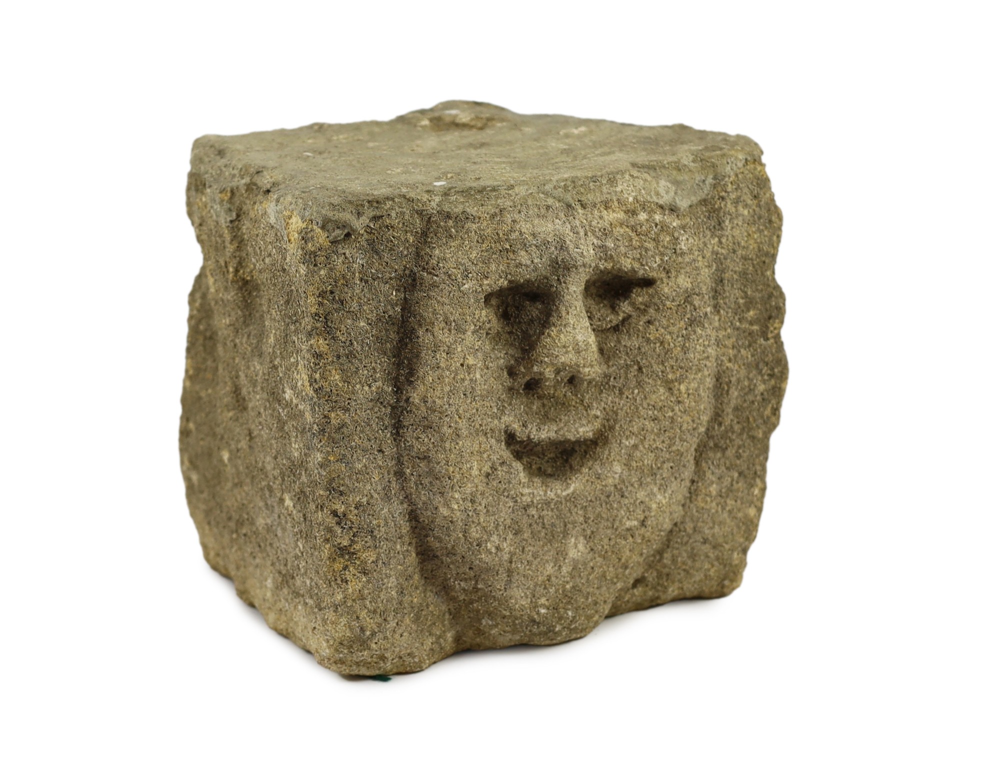 A rare Anglo-Saxon limestone mask corbel, 10th/11th century, 21cm high, 23.5cm wide, 21.5cm deep